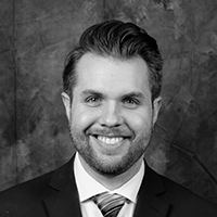 Busey associate Blake Shannon smiling