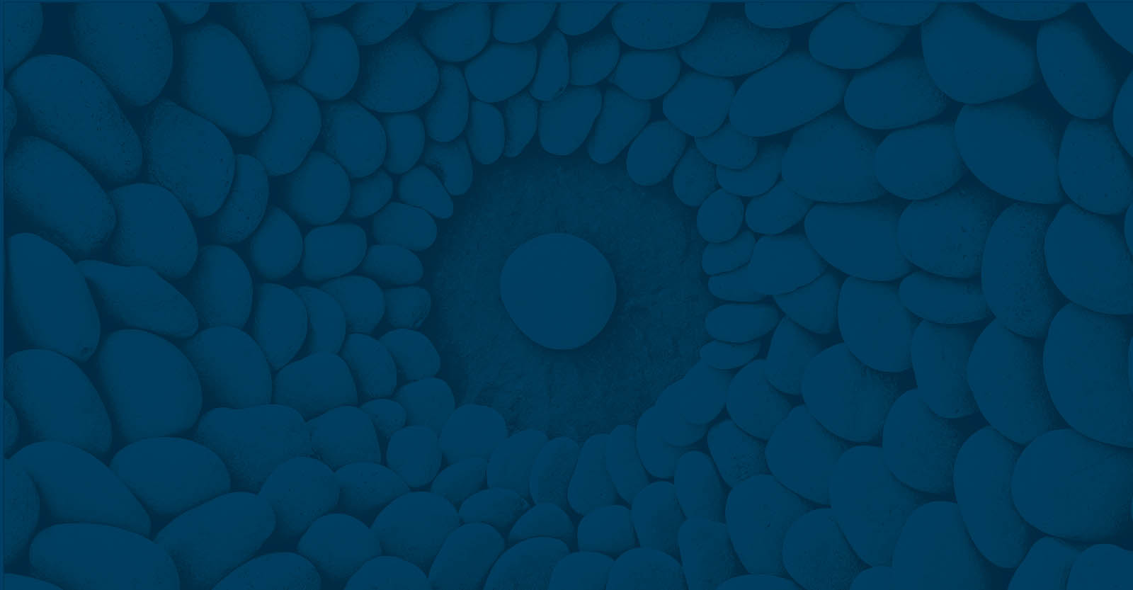 stones in a concentric circle with blue overlay