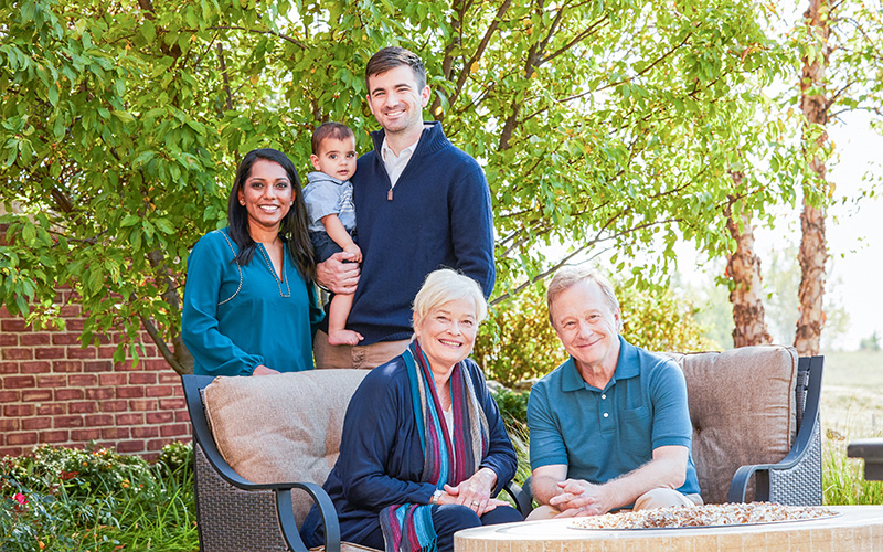 A family with multiple generations taking a photo together