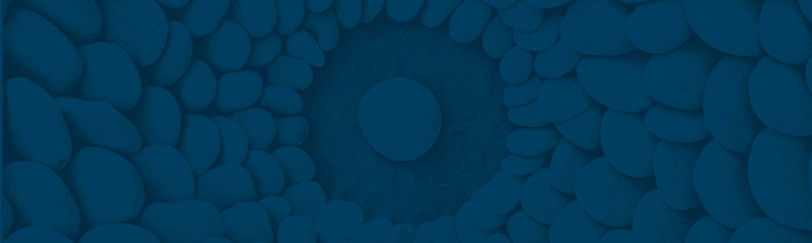 stones in a concentric circle with blue overlay