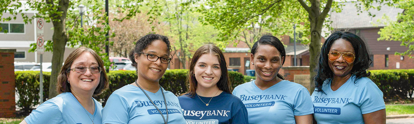 Five women Busey associates smiling