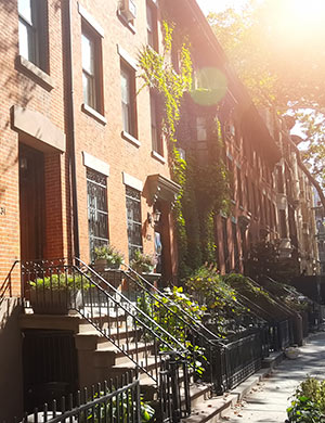 Row of brick apartments.