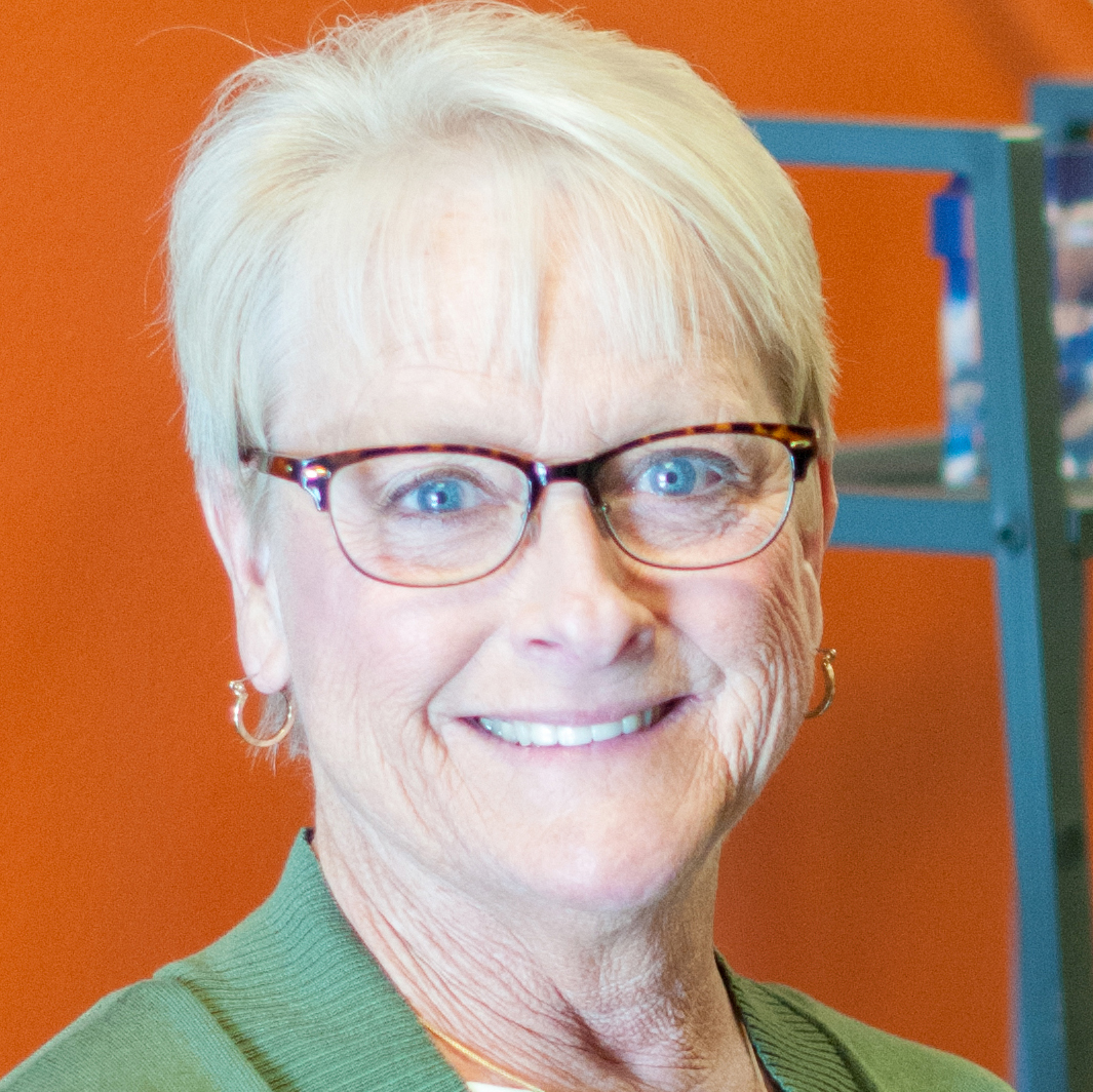 Smiling Busey associate profile image
