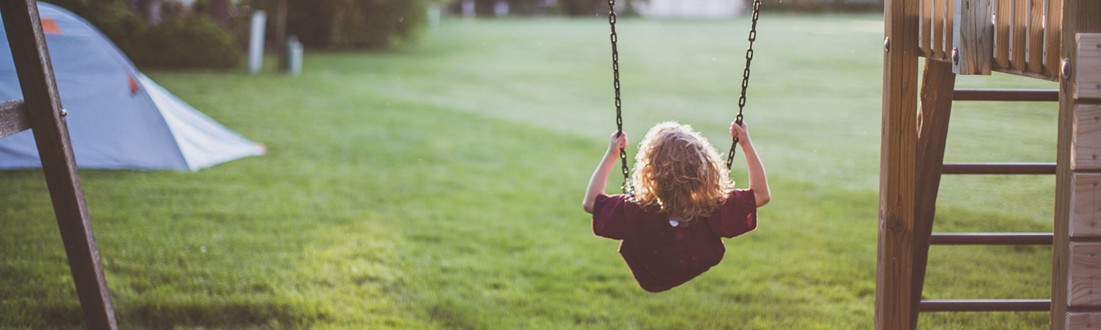 Kid swinging