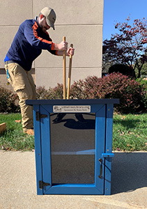 Building Little Free Library box at Kirby