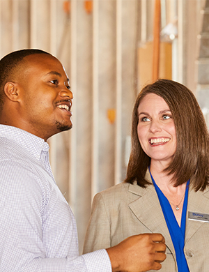 Man talking to a Busey Associate