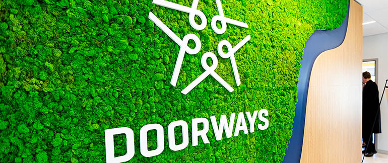 a wall sign labeled as DOORWAYS